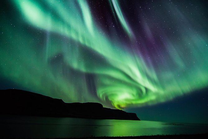 #1 Northern Lights Tour In Iceland from Reykjavik with PRO photos - Leaving Reykjavik after dark