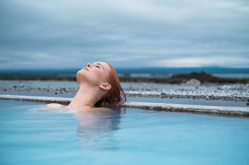Akureyri Port: Myvatn Nature Baths & Godafoss Waterfall Tour - Goðafoss: Icelandic history beside a broad waterfall