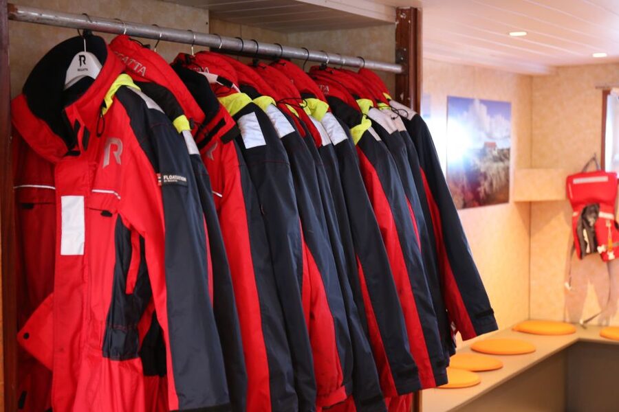 From Reykjavik: Northern Lights Boat Cruise - Warm overalls, cold decks, and the heated cabin