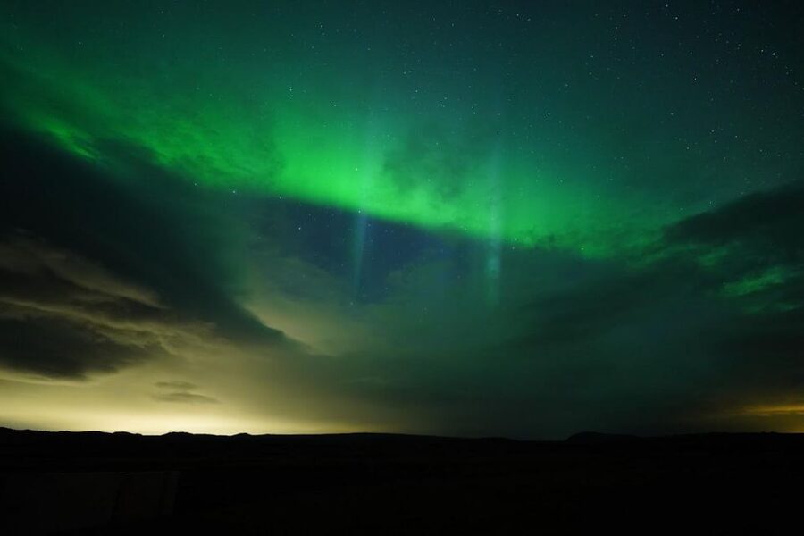 From Reykjavik: Northern Lights Tour with Hot Cocoa & Photos - The minibus ride and the value of a smaller group