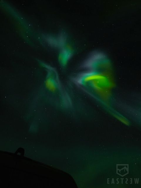 From Reykjavik: Northern Lights Tour with Hot Cocoa & Photos - The secret stop: waiting for the sky to cooperate