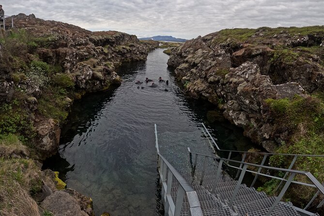From Reykjavik- Silfra Snorkeling transfer included - Getting into the water at Silfra