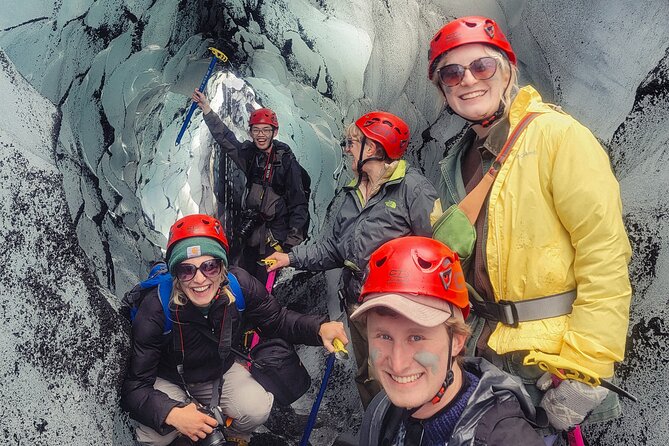 Glacier Hike at Sólheimajökull Shared Experience - Getting fitted with crampons, helmets, and ice axes