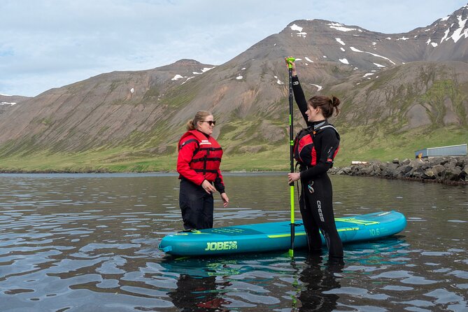 Guided SUP tour in Siglufjörður / Siglufjordur. - Following the route through Sigló fjord