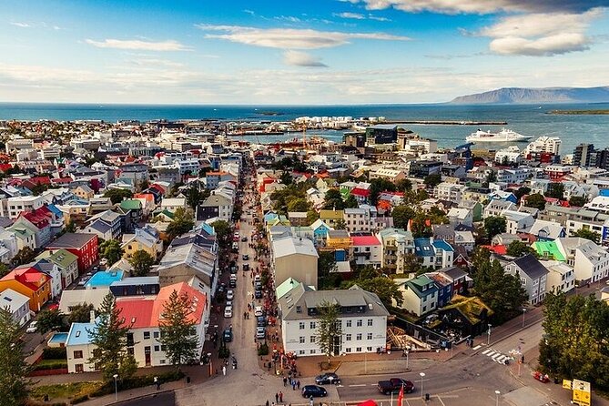 Helicopter Tour: Reykjavik City with landing at Mount Esja - Leaving the airport and seeing Reykjavik from above