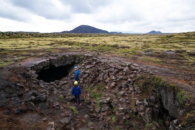 Lava Tunnel Caving & Snorkeling in Silfra with Transfer | Free Photos - Crawling through Leidarendi’s 900-meter lava tube