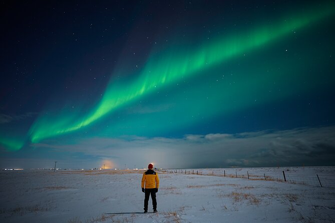 Northern Lights Tour with Photos, Snacks, Warm Snowsuits, Chairs - Hot chocolate and Icelandic snacks