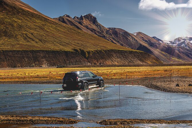 Private Full-day Hidden Highlands Tour from Reykjavík with Luke by Jeep - Hjálparfoss combines water and basalt