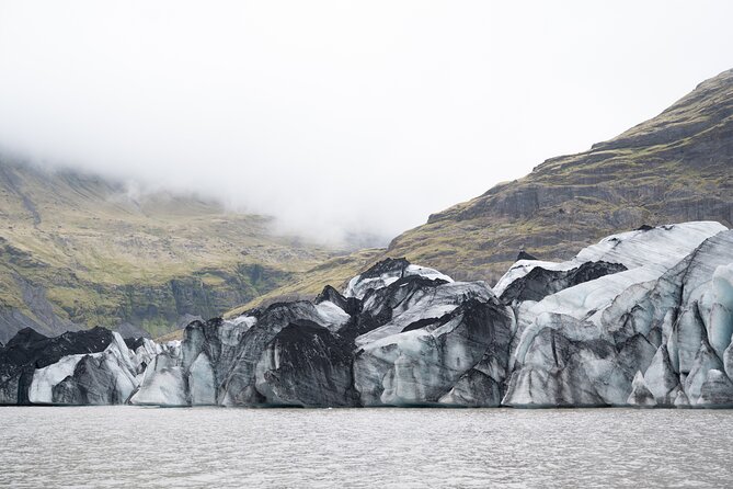Private Glacier Hike on SÓLHEIMAJÖKULL : Blue Ice Expedition - Gearing up with crampons, helmet, and ice axe