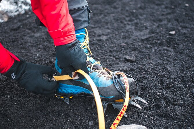Private Guided Hike Experience on Sólheimajökull Glacier - Getting fitted with crampons and glacier gear