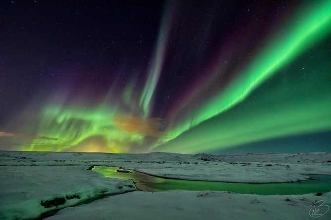 PRIVATE Northern light photo infused tour - Hot chocolate and the final ride back