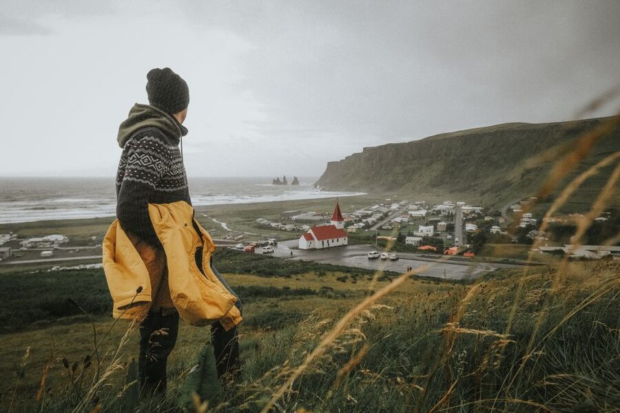 Private South Coast, Ice Cave & Black Sand Adventure - A short look at Vík beneath the cliffs