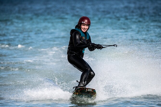 Private wakeboarding or waterskiing trip in Westfjords - The Flateyri setting is more than a backdrop