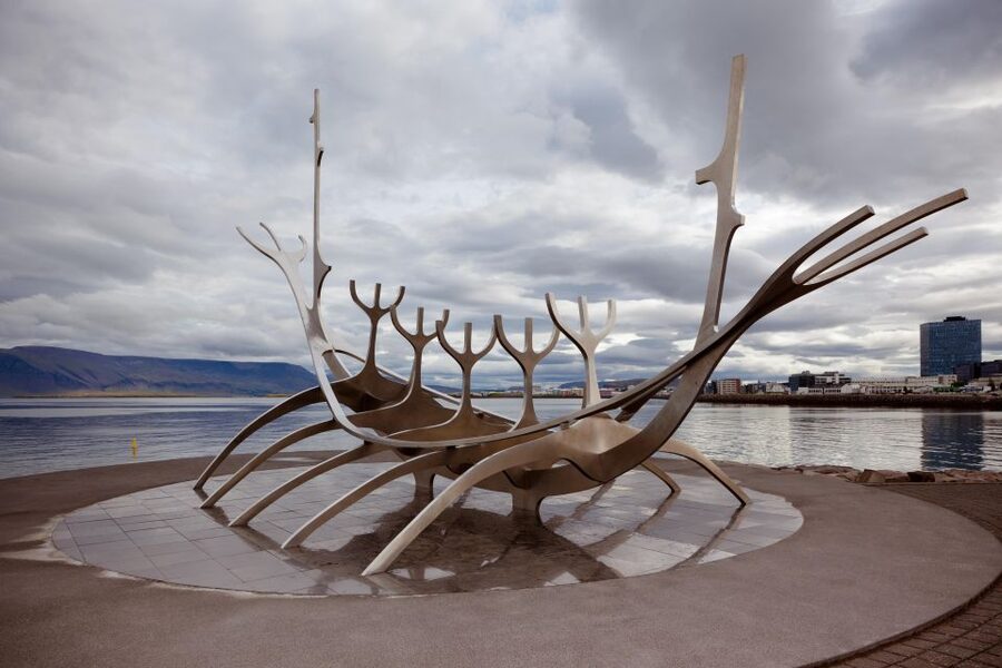 Reykjavik: Express Walk with a Local in 60 minutes - Harpa Concert Hall adds a modern contrast