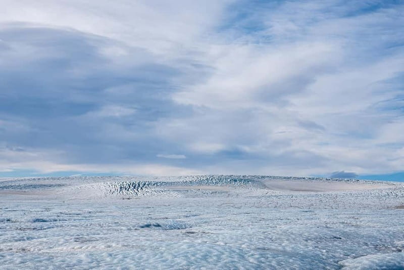 Reykjavík: Glacier Snowmobile and Hot Springs with Pickup - One hour on the white expanse of Langjökull