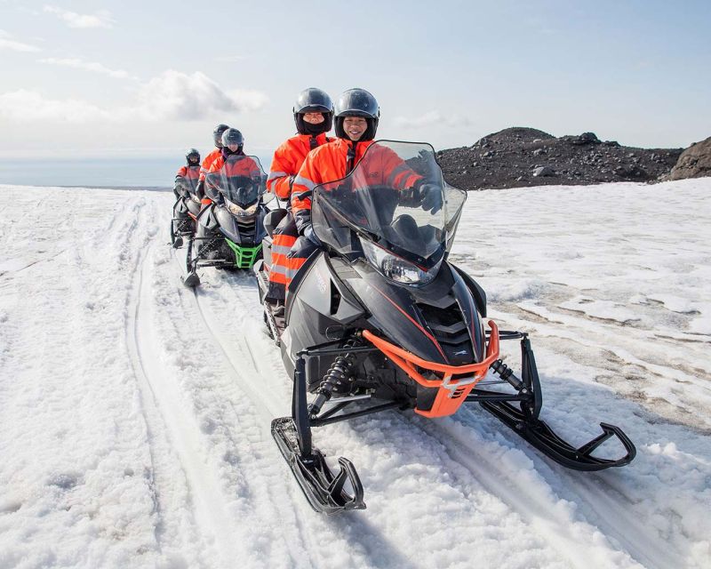 Reykjavik: Iceland South Coast & Glacier Snowmobile Tour - Riding the modified glacier truck