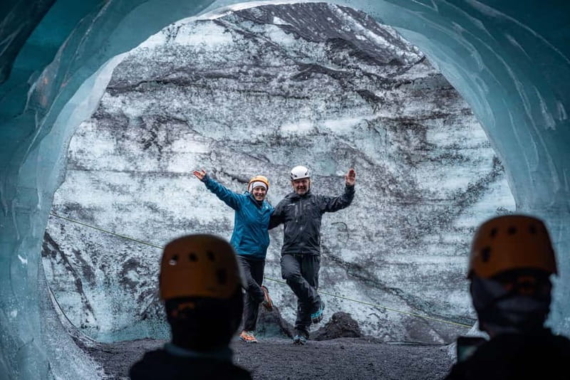 Reykjavik: Katla Ice Cave & South Coast Waterfalls Tour - Hiking across black-streaked glacier ice