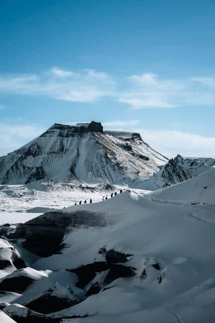 Reykjavik: Katla Ice Cave & South Coast Waterfalls Tour - Seljalandsfoss at the end of a long day