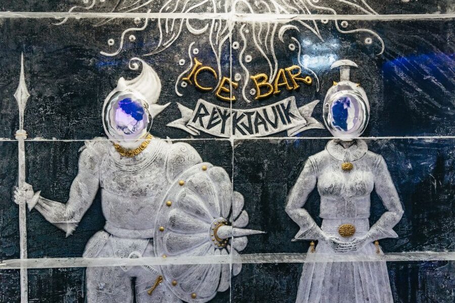 Reykjavik: Magic Ice Bar Entrance and Welcome Drink - Viking sailors carved into the walls