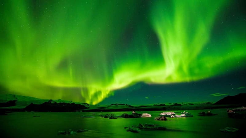 Reykjavik: Northern Lights Adventure Tour with Hot Chocolate - Leaving Reykjavik’s city glow
