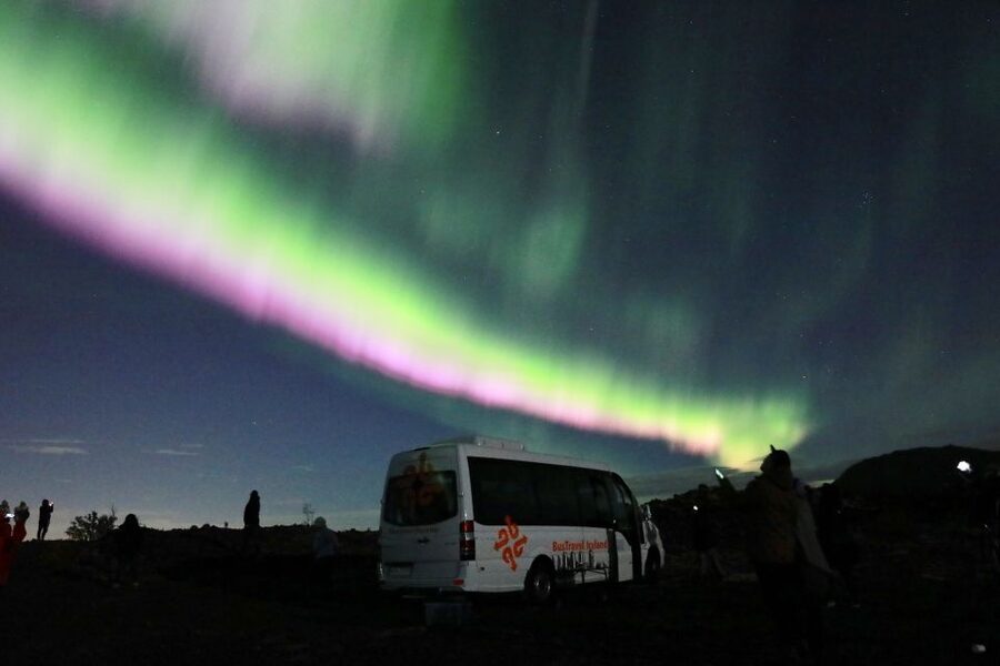 Reykjavik: Northern Lights Group Tour with Photos - Leaving Reykjavik after dark