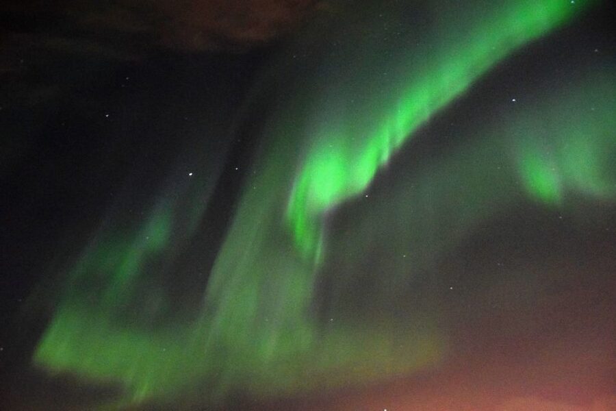 Reykjavik: Northern Lights Guided Boat Tour - Warm overalls, hot drinks, and the cold problem