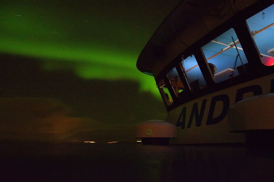Reykjavik: Northern Lights Guided Boat Tour - A boat tour compared with a land hunt