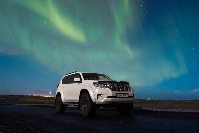 Reykjavik Private Northern Lights Tour with Pro Photographer - Searching beyond the city lights