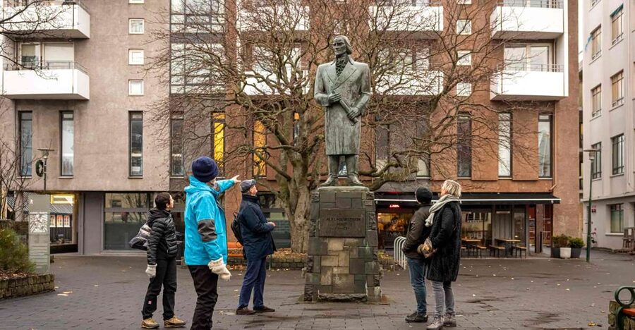 Reykjavik: Sightseeing Walking Tour with a Viking - Ingólfur Square and Austurvöllur: a quick lesson in the old center