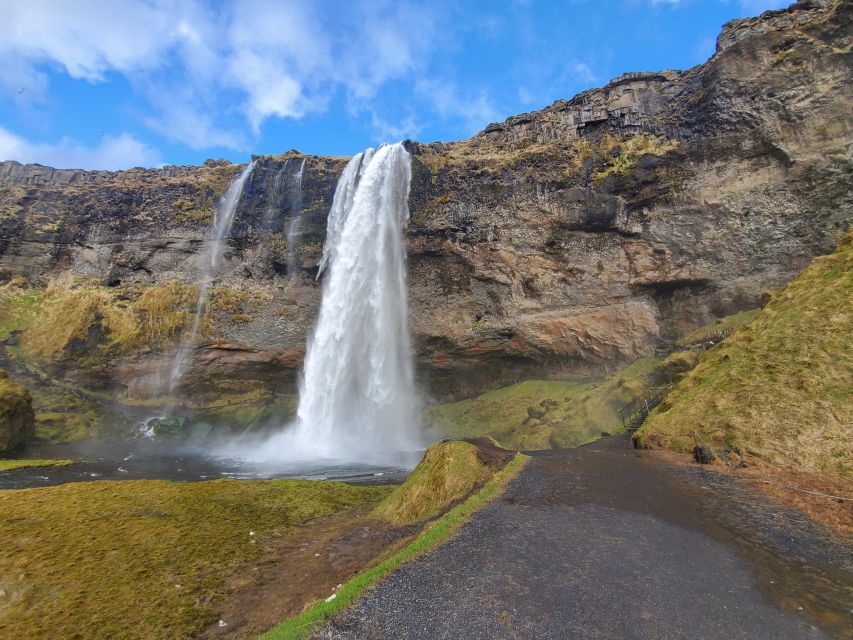 Reykjavik: South Coast and Katla Ice Cave Small Group Tour - Seljalandsfoss: a waterfall with a rear view