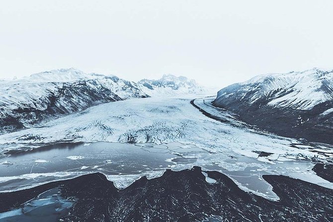 Scenic Airplane flight around Skaftafell National Park - Skeiðarársandur’s black-sand geometry