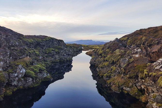 Silfra Drysuit Snorkeling with Free Photos - Meet on Location - Winter conditions deserve serious planning