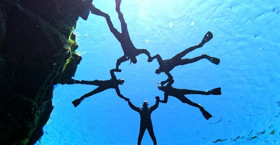 Silfra: Half-Day Snorkeling Day Trip with Underwater Photos - Getting into the drysuit without losing your nerve