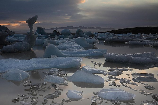 South Coast and Glacier Lagoon Day Trip by Super Jeep from Reykjavik - Skógafoss, where scale does the talking