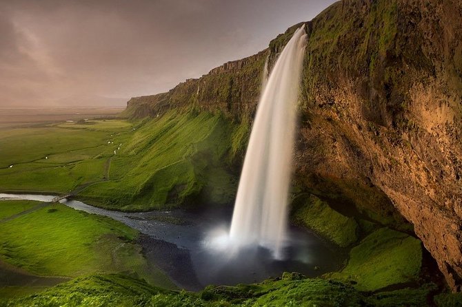 South Coast - Private - Skogafoss: a broad wall of falling water