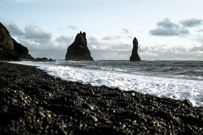 South Iceland Highlights and Northern Lights Combo Full-Day Tour - Reynisfjara: beauty with a serious warning